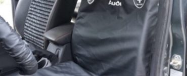 Áo trùm ghế ô tô chống bụi in logo