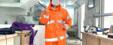 Sản xuất áo mưa bộ màu cam