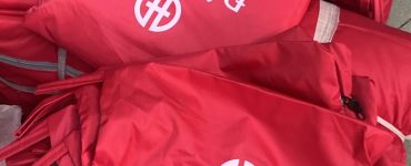 Địa chỉ làm áo mưa in logo quảng cáo